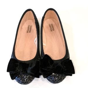 Sparkly sequin flat with black velvet bow